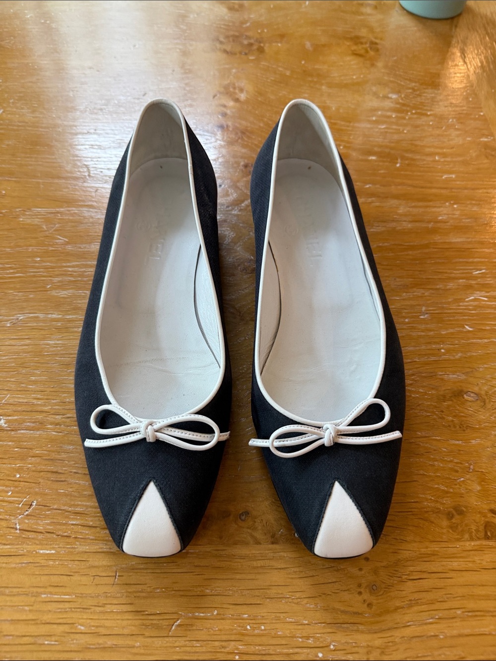CHANEL Black and White Pointed Toe Bow Ballet Flats